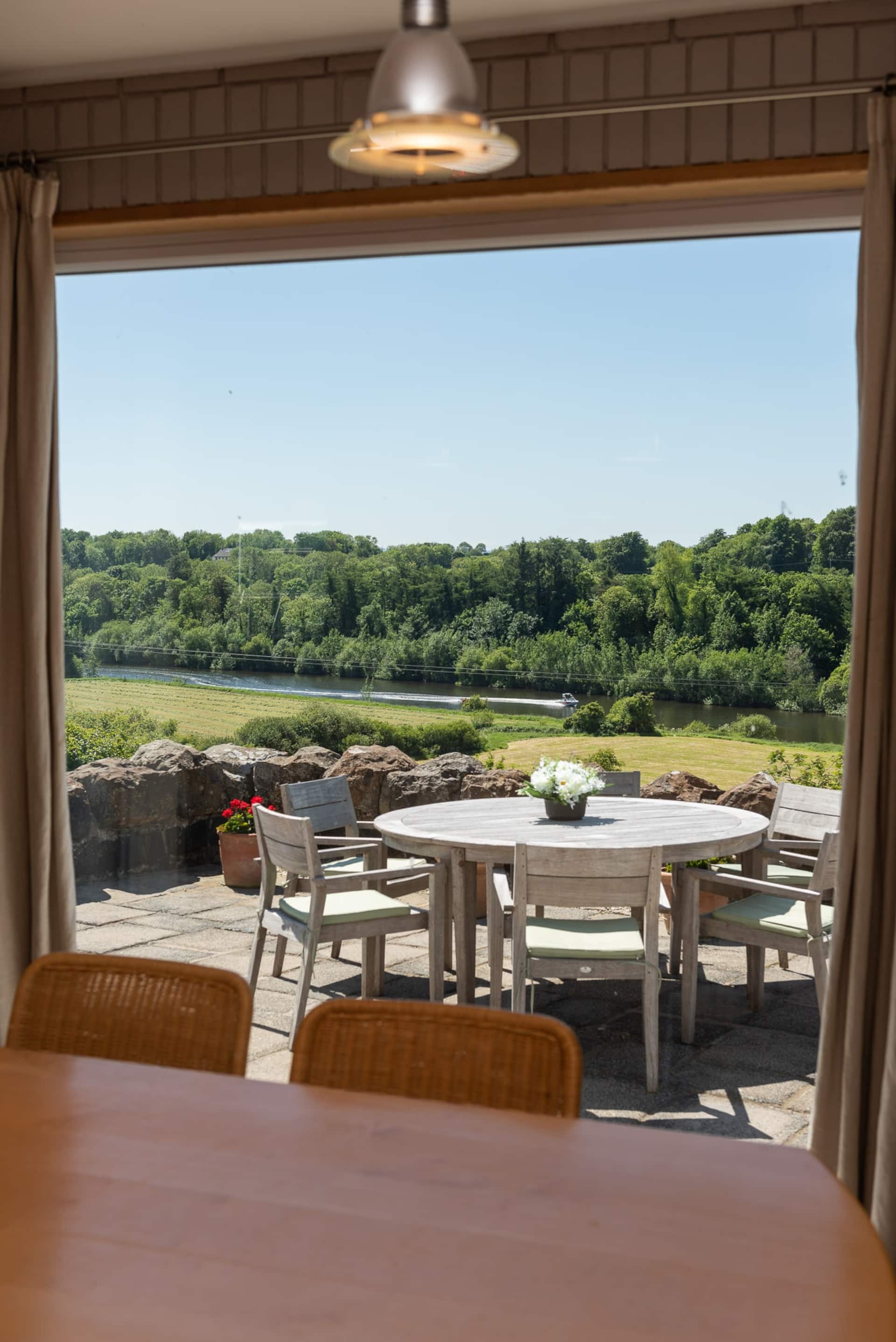 The terrace at Dundarragh Lodge looking over the River Bann