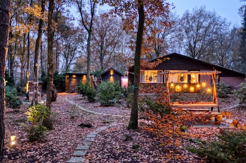 Lodge in a wooded area with Hottub & Sauna