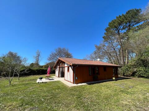 Typical Landes house by the lake and forest