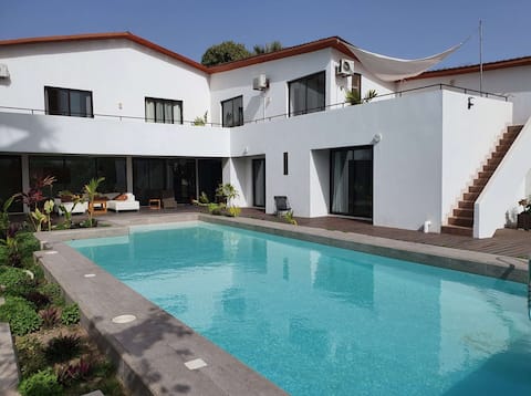 Exclusive 7-bedroom group house near beach