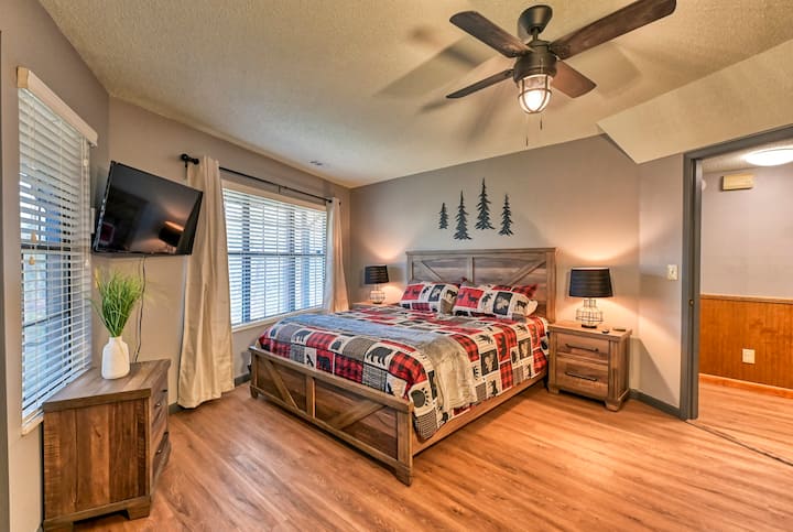 This large Master Bedroom has direct access to the hot tub , closet and flat panel smart television 