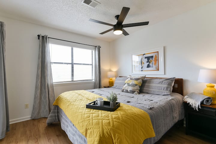 The second bedroom features a King mattress, blinds and curtains, and a closet to store clothing. The mattress has a 4-inch foam topper so you can get a perfect nights rest while on vacation!