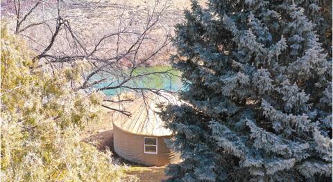 Riverfront Yurt near Hot Springs and Hiking.