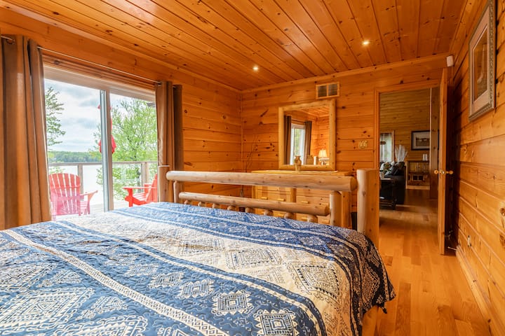 King bedroom with private walk-out to the lakefront deck