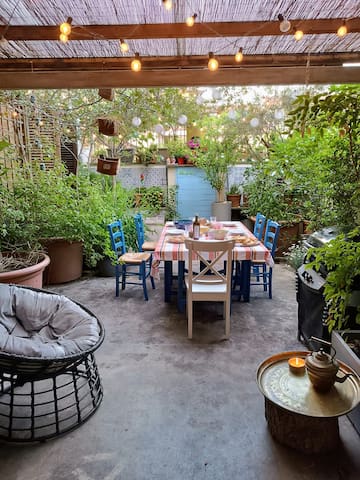 Casa e terrazzo verde in centro