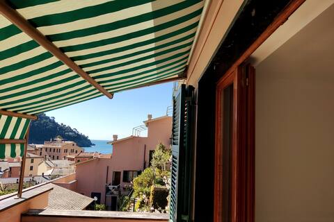 A stone's throw from the sea with a large terrace