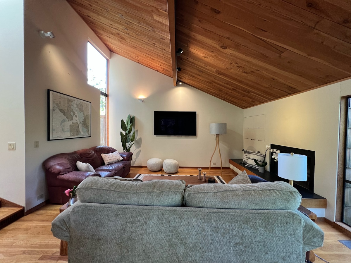 Living room with 65" TV in background