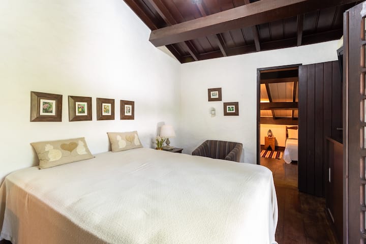 Room #4. 1 king-size bed + 2 single beds. Balcony with views of nature.