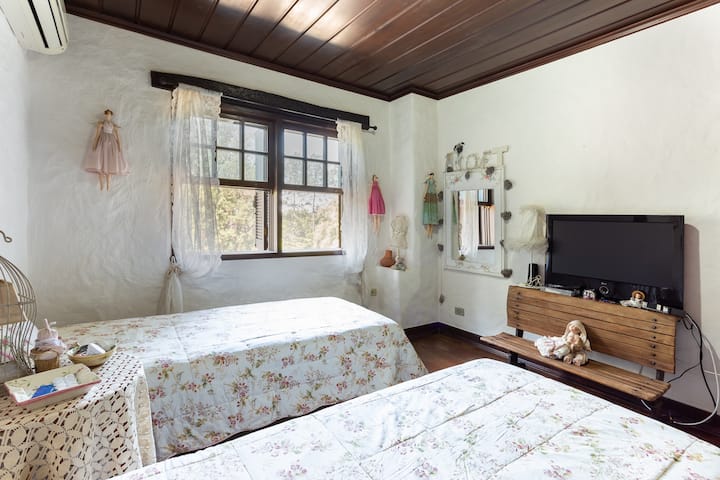 Room #2. 2 single beds and lake views.