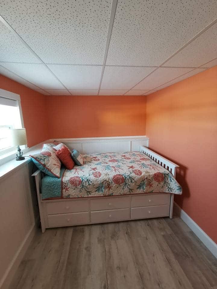 Lower Level bedroom with double bed and single trundle bed