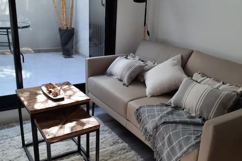 Successful Airbnb property: Modern Studio w/private patio, pool and gym in Pocitos