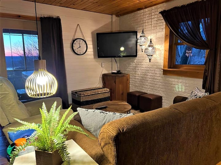 Cozy room to relax;  hot tub just outside the sliding door