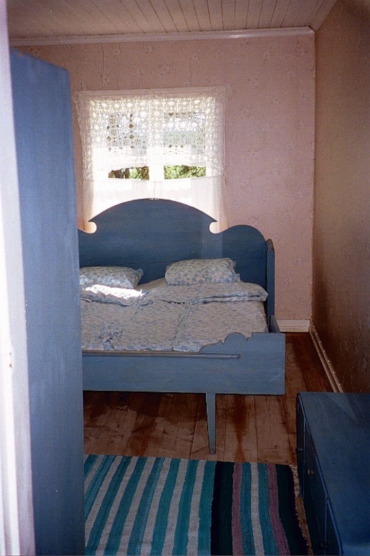 Double bed with two mattresses.