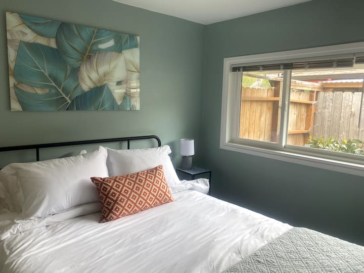 Bedroom #1 - queen bed and ample closet storage.