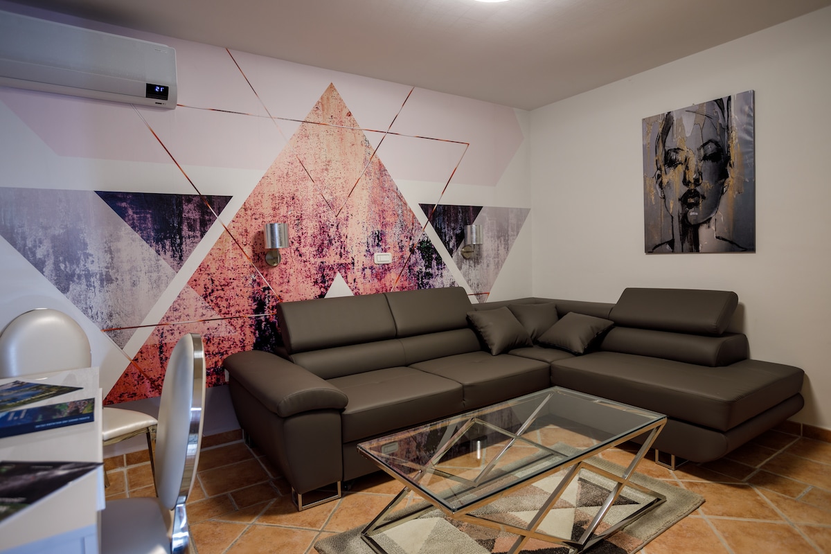 Sala de estar, con una zona de estar que permite una cama adicional de 140 x 200 cm