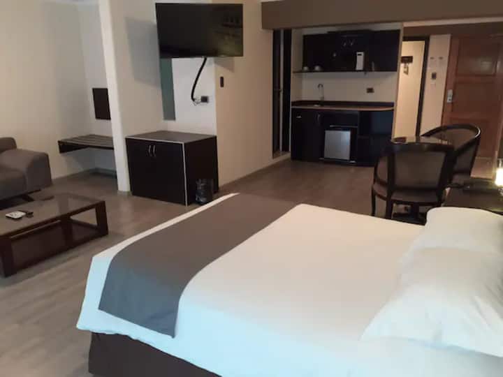 Room measuring 43 m2 with bathroom, and breakfast included