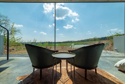 Separate garden pavilion surrounded by nature