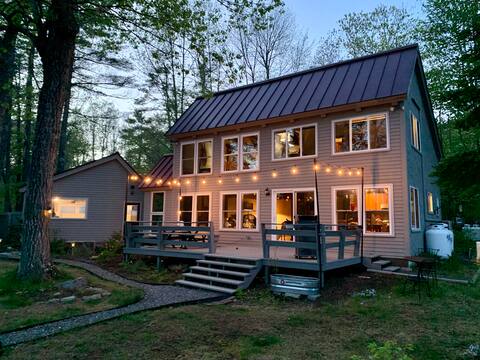 sunny lakefront cottage in quiet woodsy setting