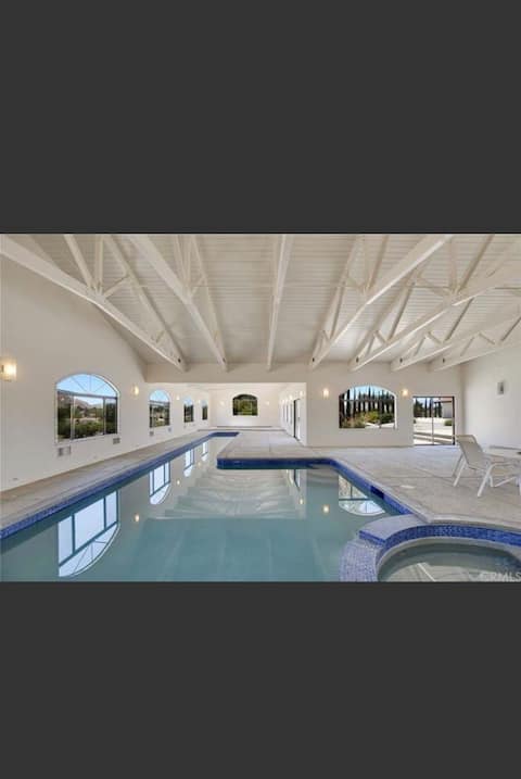 Oasis indoor swimming pool & very spacious home.