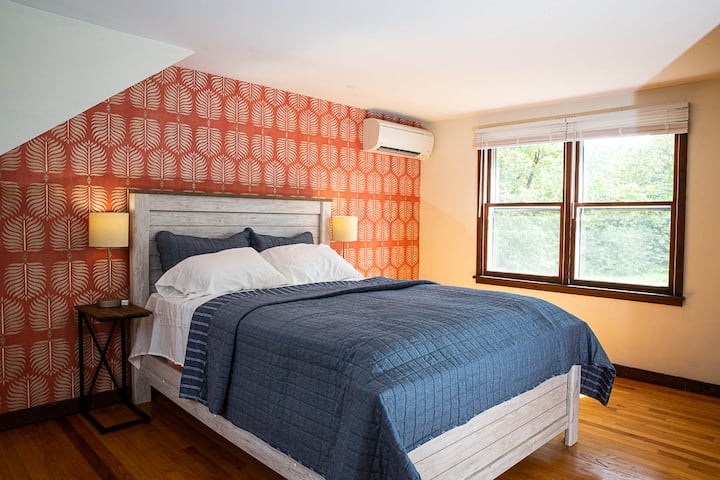 Master Bedroom

Rest easy in this charming bedroom featuring a comfortable queen-sized bed, natural light, and stylish decor. Perfect for a peaceful night's sleep after a day of exploring. Enjoy the serene ambiance and beautiful views.