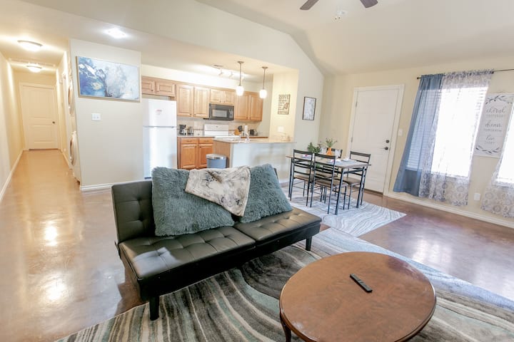 Your comfy living room, where you can sit and relax watching your favorite movies..