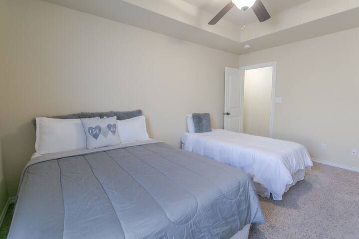 Your comfy bed in the master bedroom..