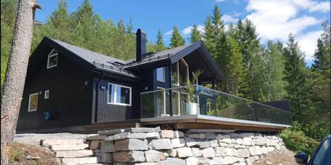 Modern cottage on a lookout plot.