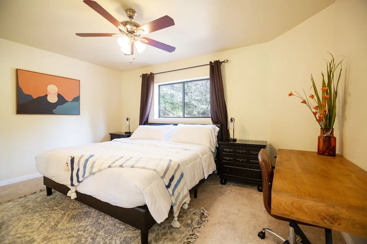What a comfy king size bed to lay your sleepy head! For a busy-minded head, use the desk to quietly get some work done! This room is connected to the main bathroom on the 1st floor. 
