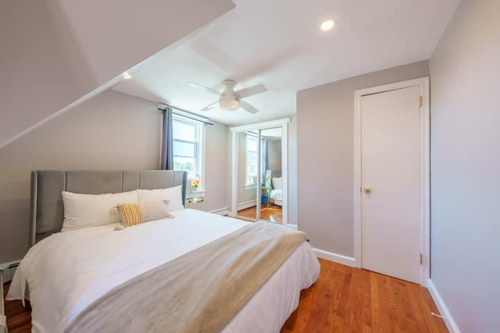 Queen Sized Bedroom (3rd Floor): Includes 3 closets, queen bed, fresh linens, ceiling fan, and window A/C.