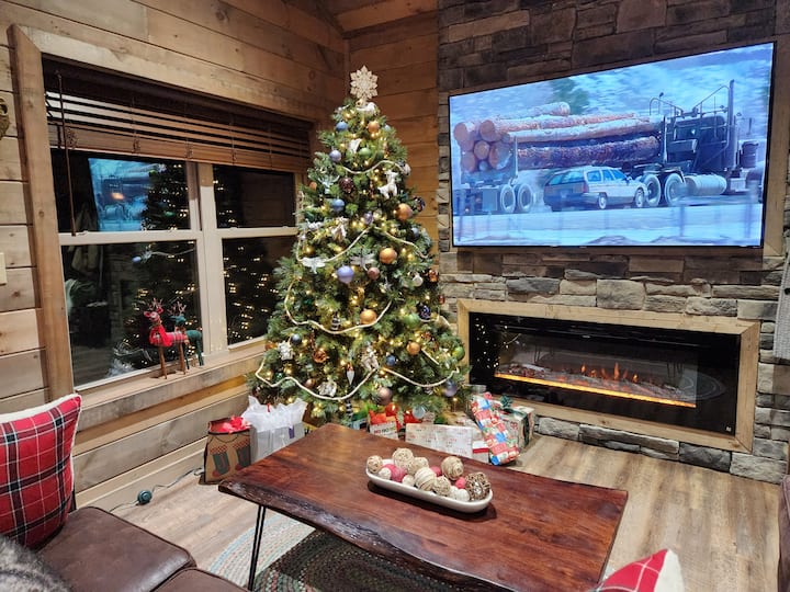 Cabin decorated for Christmas. Best Christmas movie ever on the TV :)
