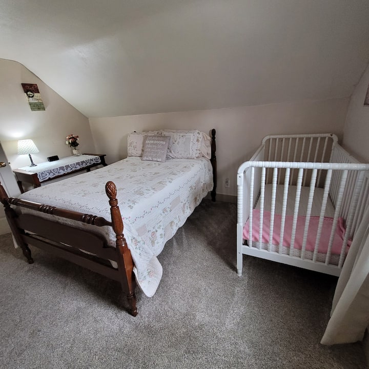 Upstairs bedroom with crib