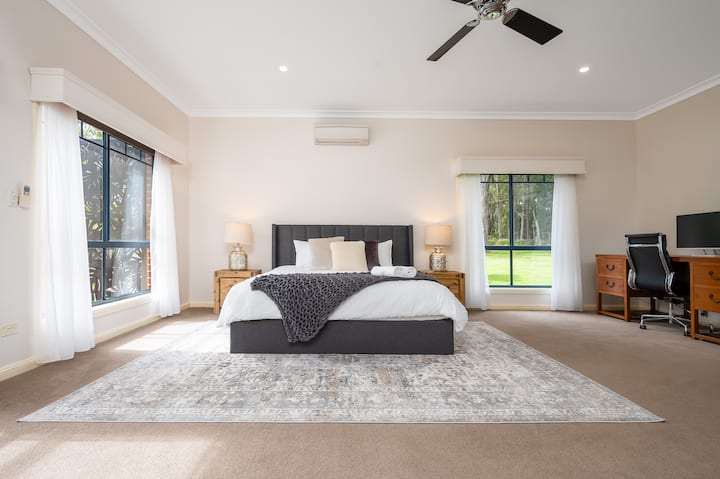 Bedroom 1 with King size bed, desk and daybed