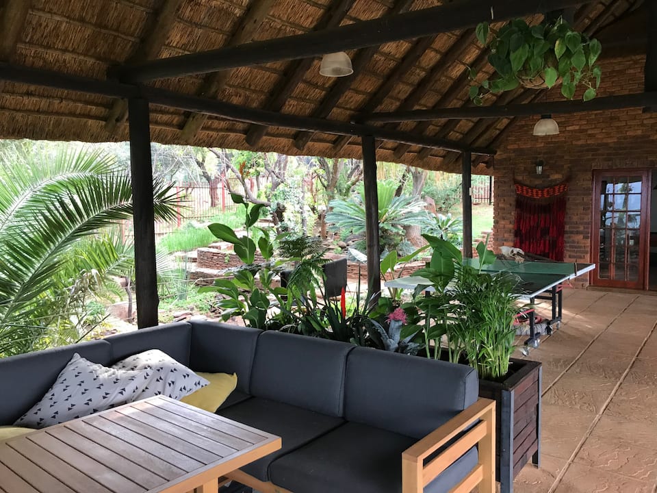 A thatched mountain lodge in a game conservancy, Hekpoort, Magaliesberg, South Africa, photo 2 of 10