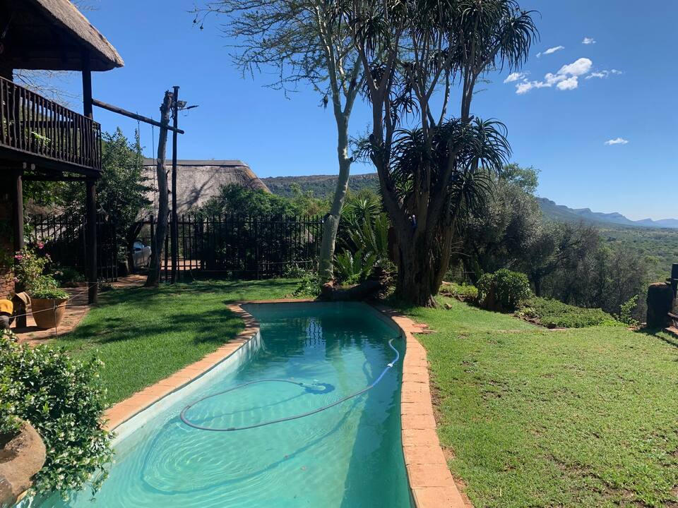 A thatched mountain lodge in a game conservancy, Hekpoort, Magaliesberg, South Africa, photo 1 of 10