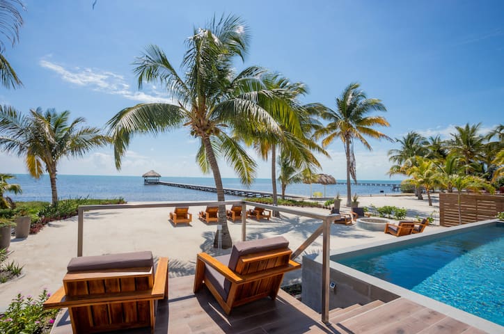Luxury beachfront home with pool, gym, more!
