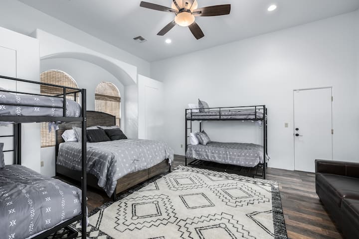 We call it the Ocotillo Room because of all the sleeping spaces.  It features two twin bunk beds with additional trundles, a queen bed and a pull out queen sofa bed.  