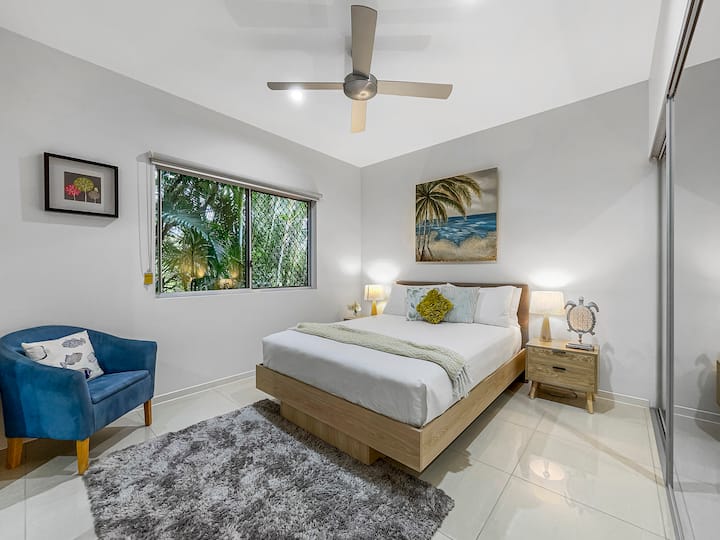 This queen bedroom offers a comfy retreat with stylish decor and direct access to a convenient 2-way bathroom.