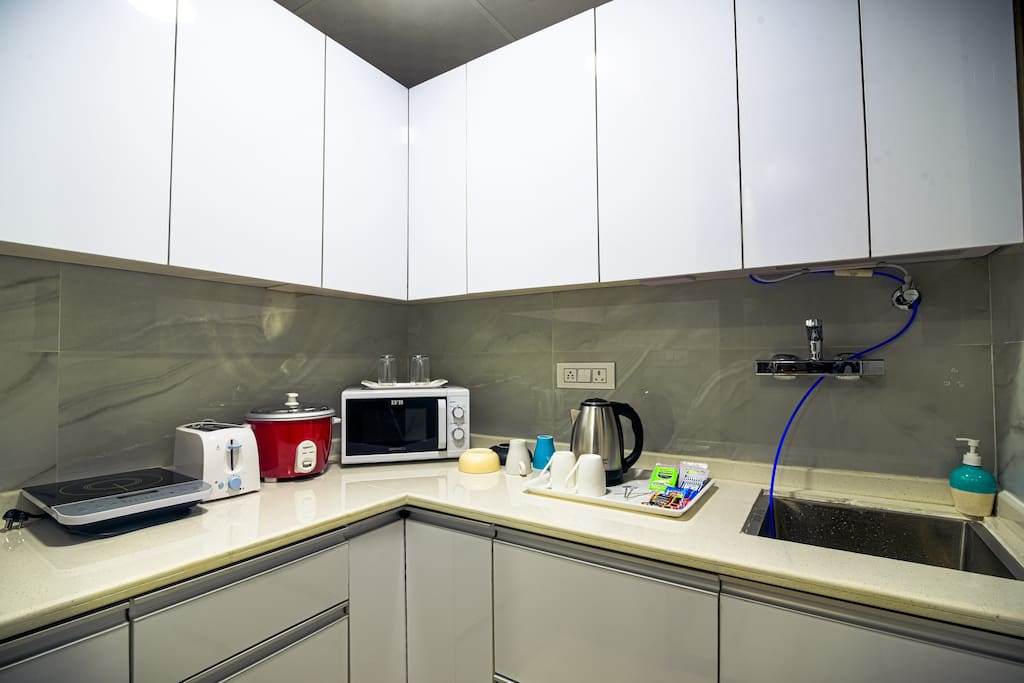 Your kitchen is fully equipped with a microwave, toaster, and tea coffee maker. Cupboards are stocked with all cooking and serving utensils, glassware, bowls plate cups, etc