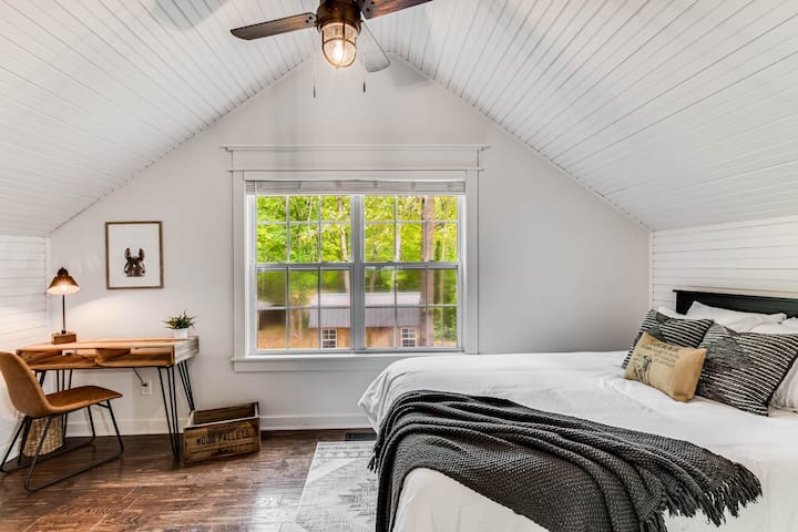 Each room has a subtle theme and here you are in the horse room. Enjoy the cozy memory foam queen bed, private workspace, and walk in closet.  There is a bathroom right next door!