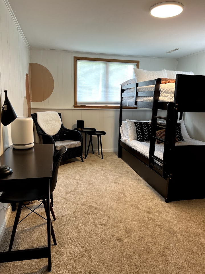 Bedroom 3, with two full size bunk beds and a twin size trundle.