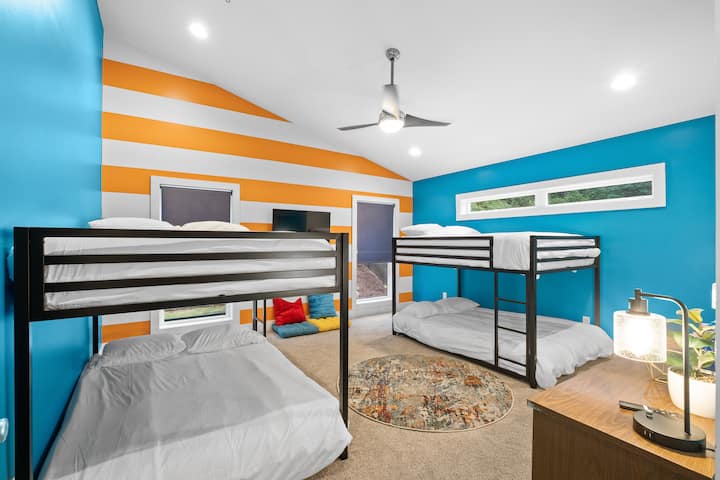 Blue bedroom, two full size bunk beds.