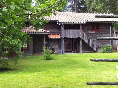 Authentic renovated log house in a rural setting.