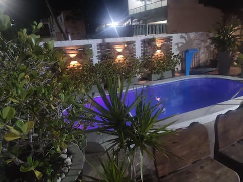 Popular Airbnb listing: Beach house with a swimming pool right on the sand in Lucena