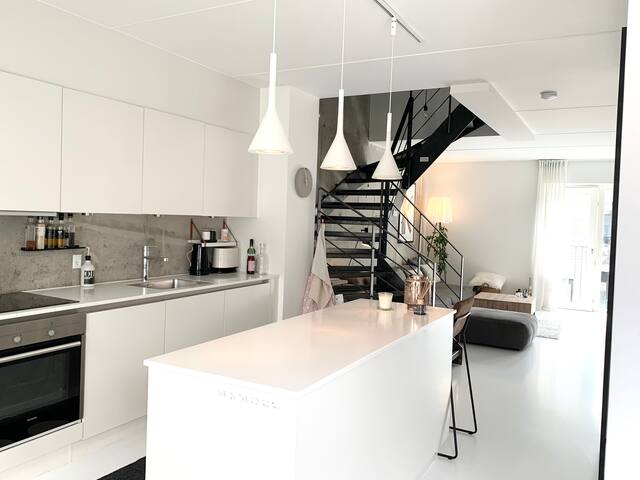 Stylish two-floor apartment with a rooftop terrace gallery image 2