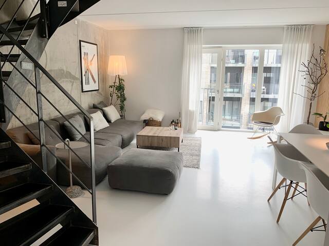 Stylish two-floor apartment with a rooftop terrace gallery image 3