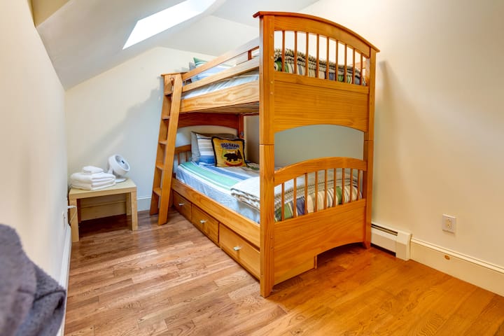 Bedroom 4 of 4 is on the second floor. Featuring a bunk bed and skylight, this is a perfect children's room. 