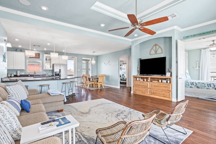 Expansive, open concept living- in the family room you’ll find a stocked entertainment system housing fun board games for all ages and a SMART Flat-screen TV.