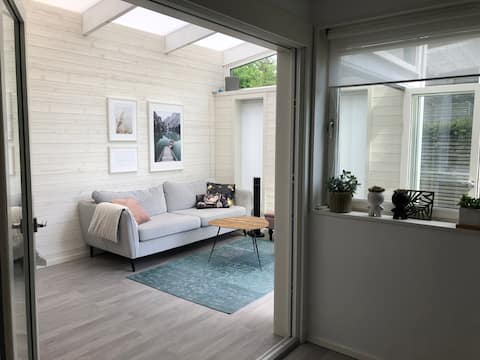 Bright house, large patios and playground next door