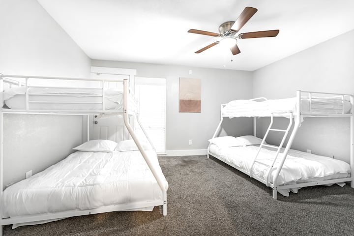 2nd bed room with two bunk beds, each bunk beds include a twin and queen size bed and comfortable mattress. 