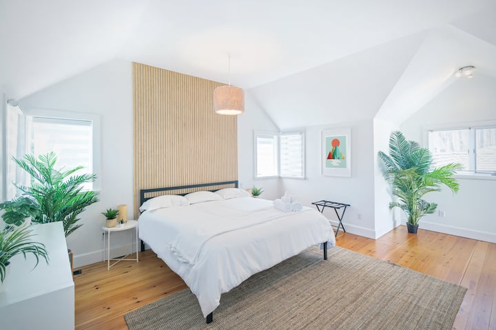 Master Bedroom (top floor) - The largest of the 4 bedrooms, it's a very bright/open space with a King bed and plenty of storage options. It also features a small balcony overlooking the front of the property. Very private as it's on its own floor.